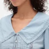Peplum-top med krage og V-hals
