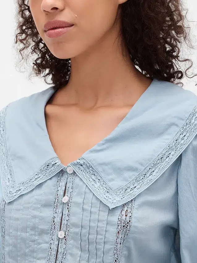 Peplum-top med krage og V-hals
