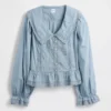 Peplum-top med krage og V-hals