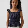 Peplum-top med smock og flagrende ermer for barn