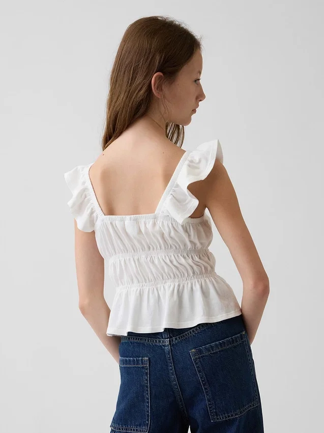 Peplum-top med smock og flagrende ermer for barn