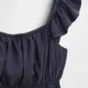 Peplum-top med smock og flagrende ermer for barn