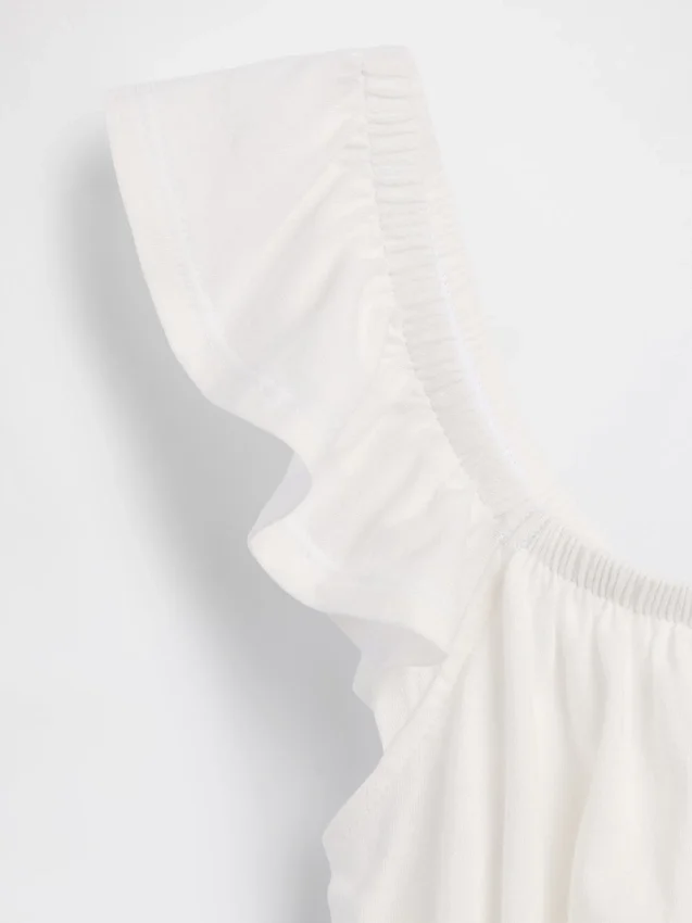Peplum-top med smock og flagrende ermer for barn
