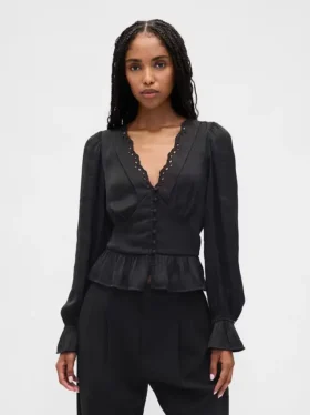 Peplum-top med V-hals og hullmønster