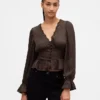 Peplum-top med V-hals og hullmønster