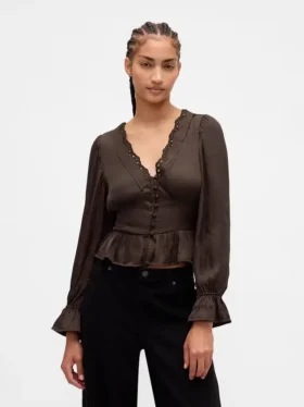 Peplum-top med V-hals og hullmønster