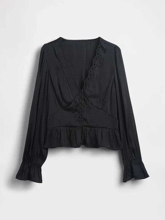 Peplum-top med V-hals og hullmønster