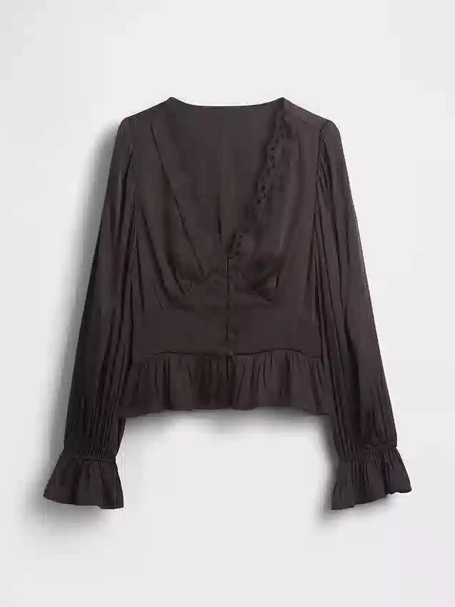 Peplum-top med V-hals og hullmønster