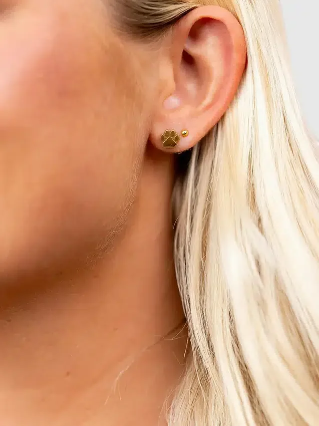 Pierced Co øredobber med poteavtrykk og skruelås
