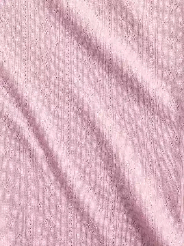 Pyjamasett for barn i resirkulert pointelle-strikk