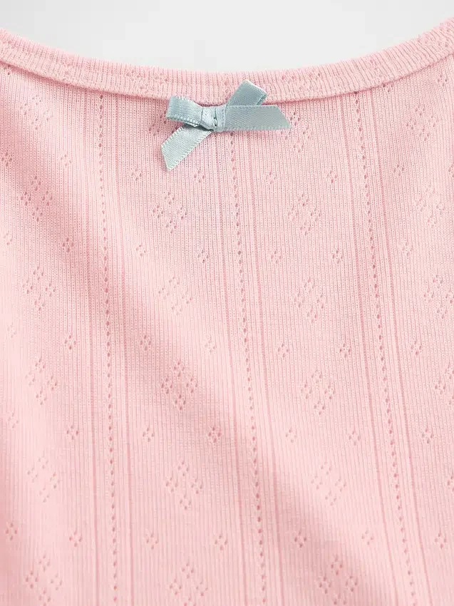 Pyjamasett for barn i resirkulert pointelle-strikk