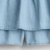 Skort i denim med lag på lag for barn