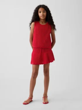 Skort med lag på lag i heklet bomull for barn