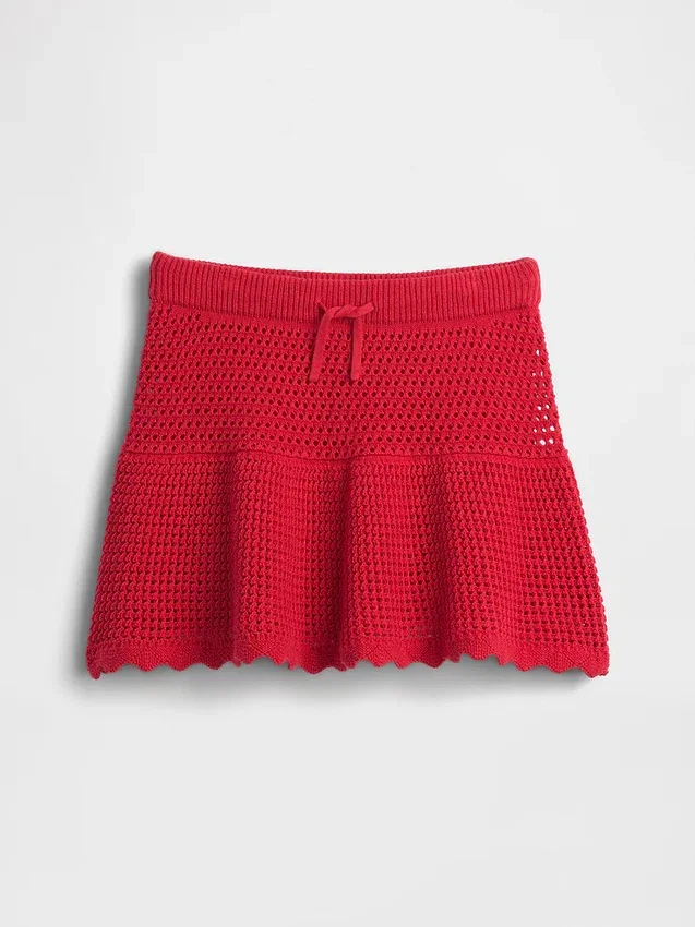Skort med lag på lag i heklet bomull for barn