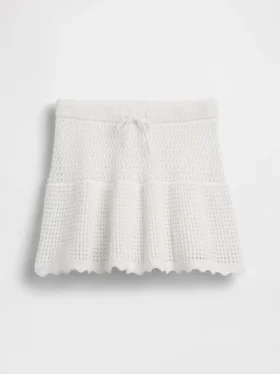 Skort med lag på lag i heklet bomull for barn
