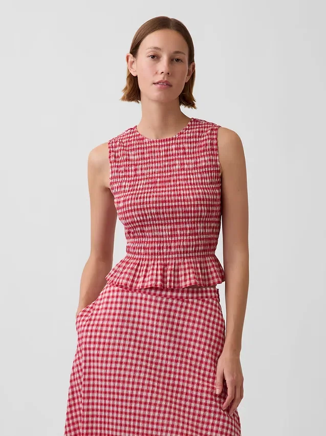 Smokket peplum-top i gingham