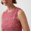 Smokket peplum-top i gingham