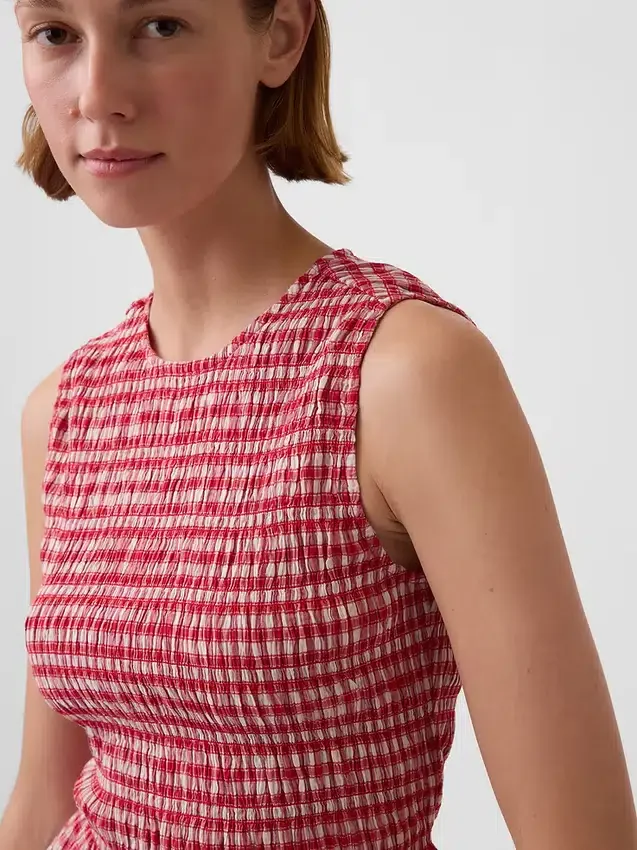 Smokket peplum-top i gingham