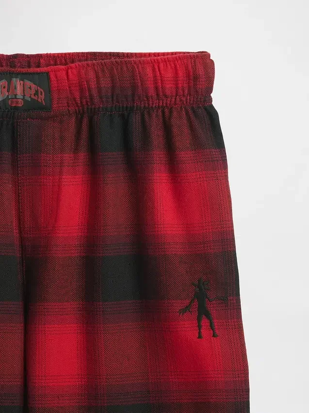 Stranger Things barnesøvnbukser i resirkulert flanell