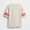 T-skjorte for barn i tykk bomullsjersey med oversized passform og logo på sømmen