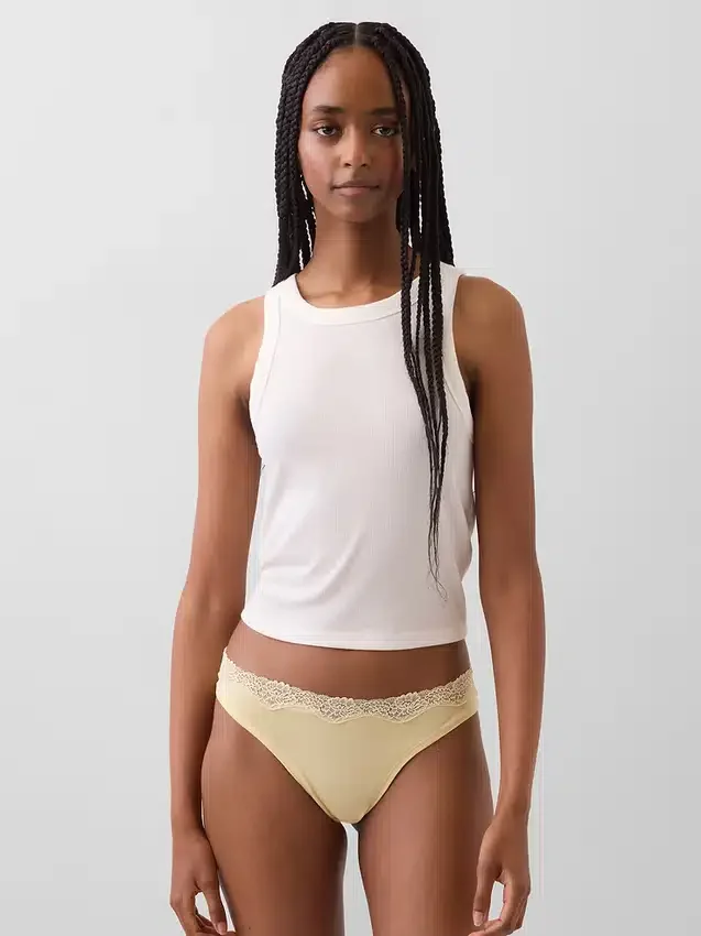 Tanga i økologisk stretchbomull med blonder