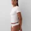 Tanga i økologisk stretchbomull med blonder