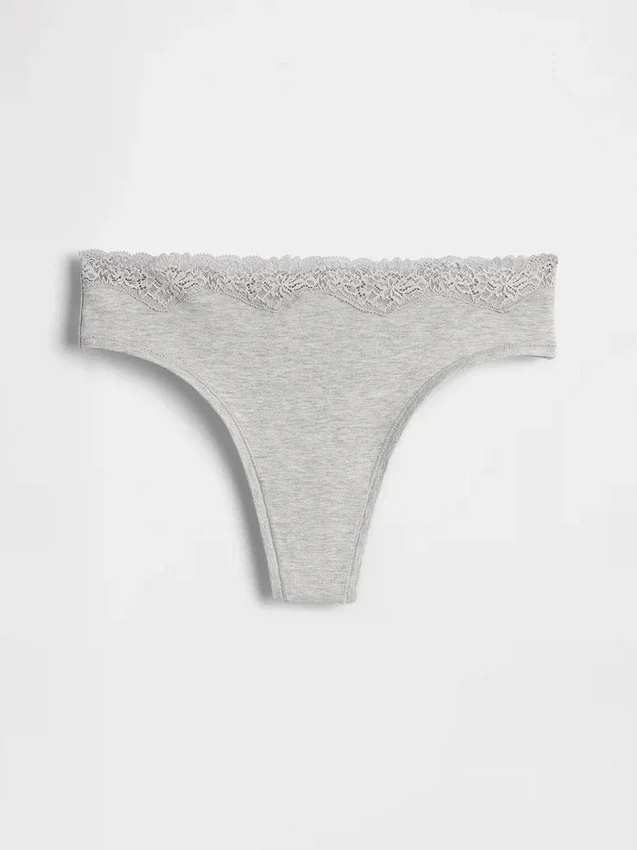 Tanga i økologisk stretchbomull med blonder
