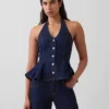 Tettsittende denim-top med halterneck og peplum