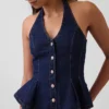 Tettsittende denim-top med halterneck og peplum