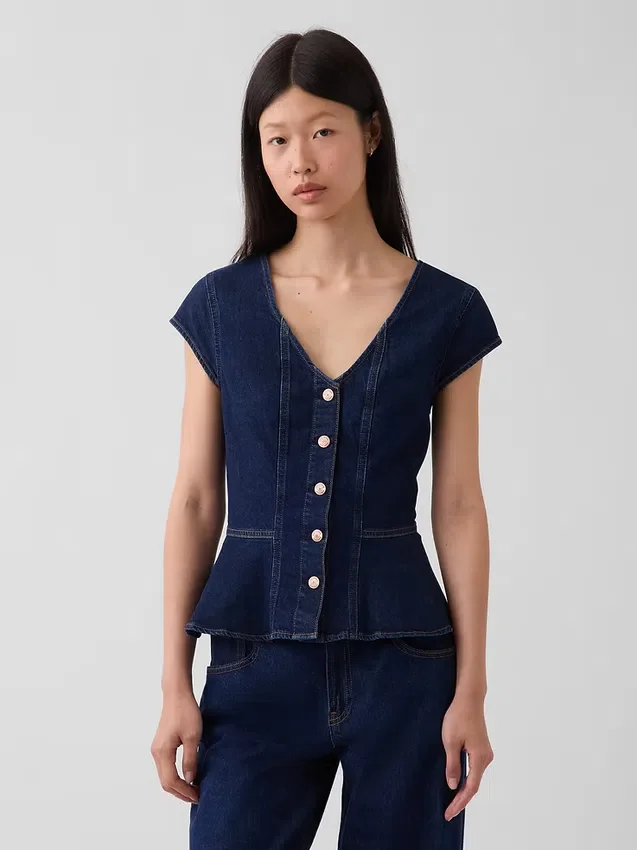 Tettsittende denim-top med kappeerm og peplum