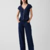 Tettsittende denim-top med kappeerm og peplum