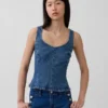 Tettsittende peplum-top i denim