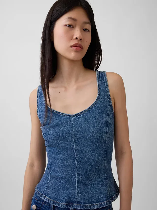 Tettsittende peplum-top i denim