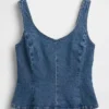 Tettsittende peplum-top i denim