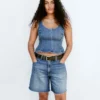 Tettsittende peplum-top i denim