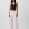 Tettstrikket halterneck-kort topp