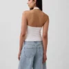Tettstrikket halterneck-kort topp
