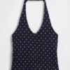 Tettstrikket halterneck-kort topp