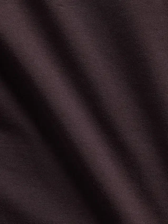 Tettstrikket jersey-T-skjorte med avdekkede skuldre og kort snitt