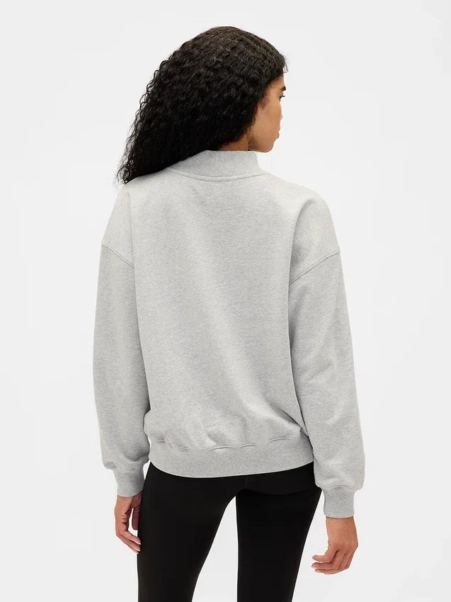 Tung French Terry-genser i oversized-modell med høyhals og logo