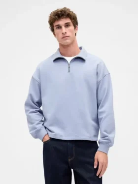 Tung, oversized genser med kvart glidelås