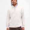 Tung, oversized genser med logo og kvart glidelås