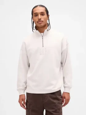 Tung, oversized genser med logo og kvart glidelås