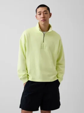 Tung, oversized genser med logo og kvart glidelås