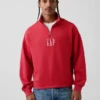 Tung, oversized genser med logo og kvart glidelås
