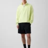 Tung, oversized genser med logo og kvart glidelås