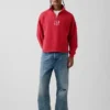 Tung, oversized genser med logo og kvart glidelås