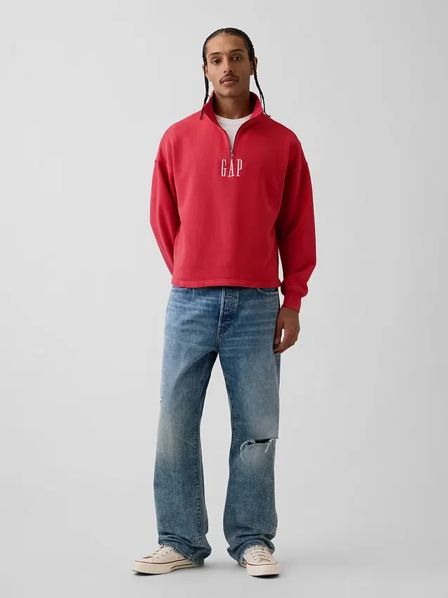 Tung, oversized genser med logo og kvart glidelås