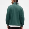 Tung, oversized genser med logo og kvart glidelås