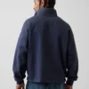 Tung, oversized genser med logo og kvart glidelås